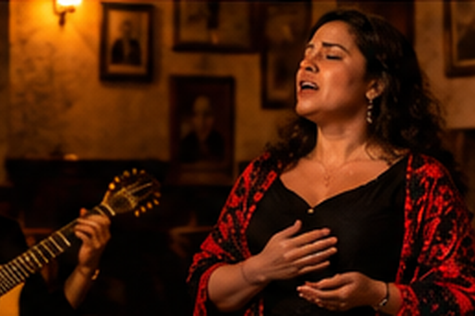 Intimate Lisbon fado performance with singer and Portuguese guitar
