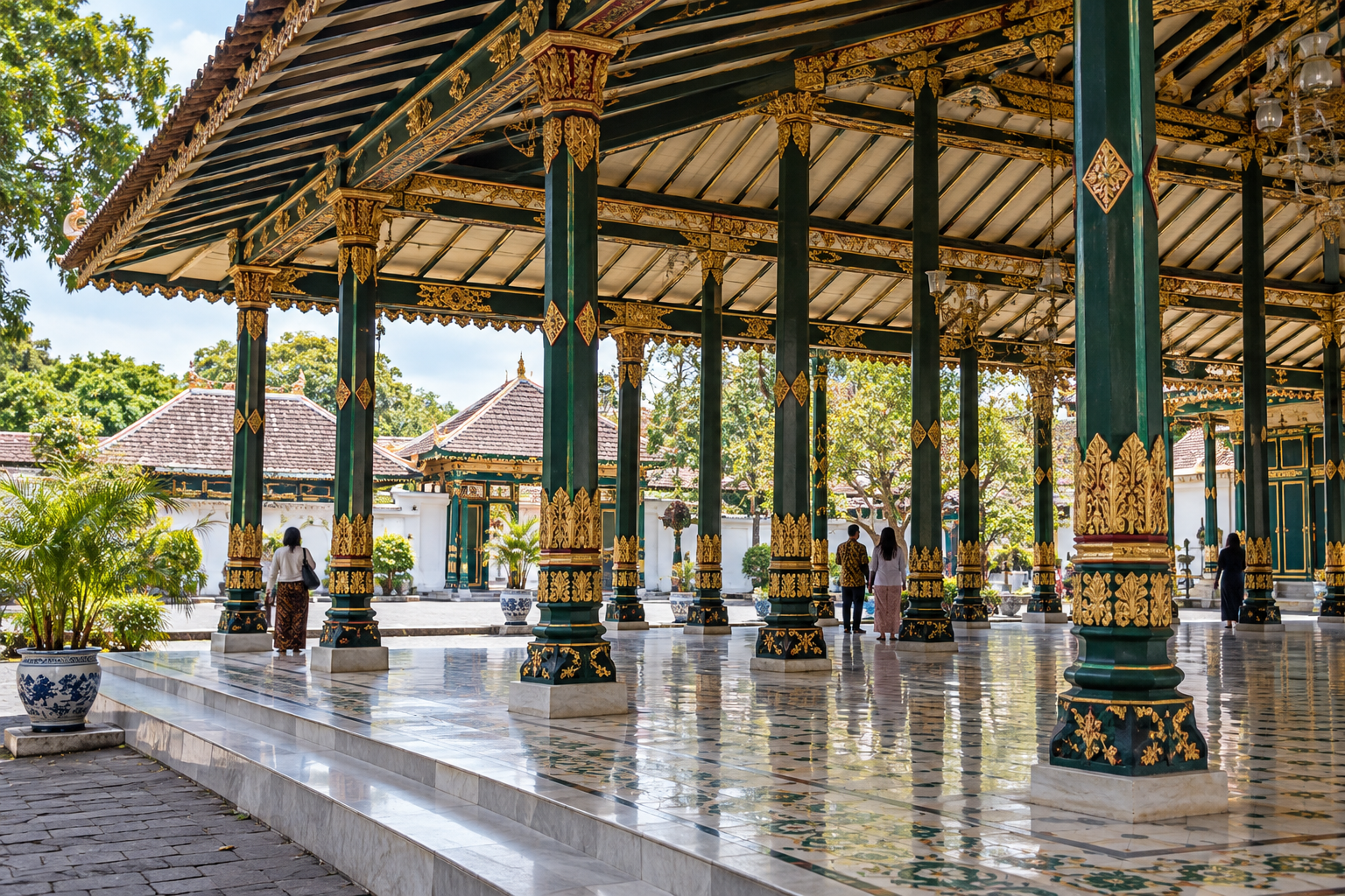 Open pavilion with green and gold columns in Yogyakarta Kraton